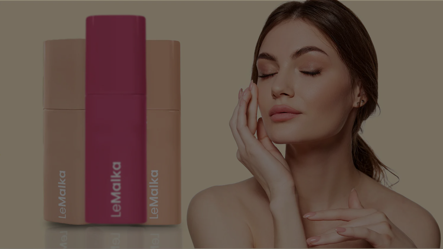 Woman touching her face with LeMalka skincare products on a reflective surface
